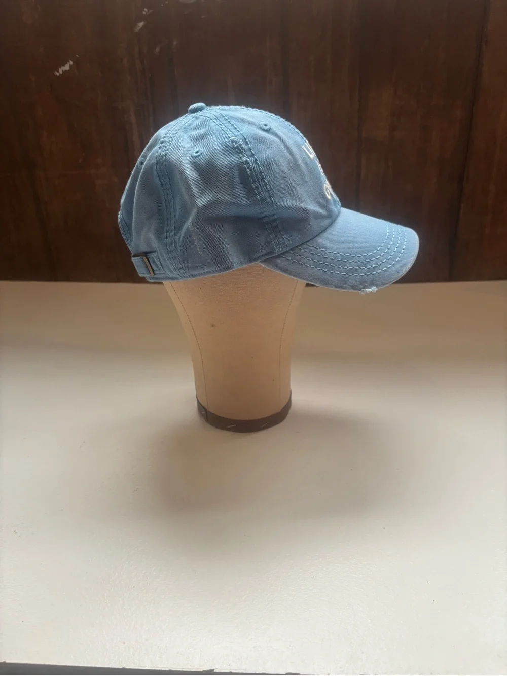 light blue Life is Good Sunwashed Chill Cap white embroidered